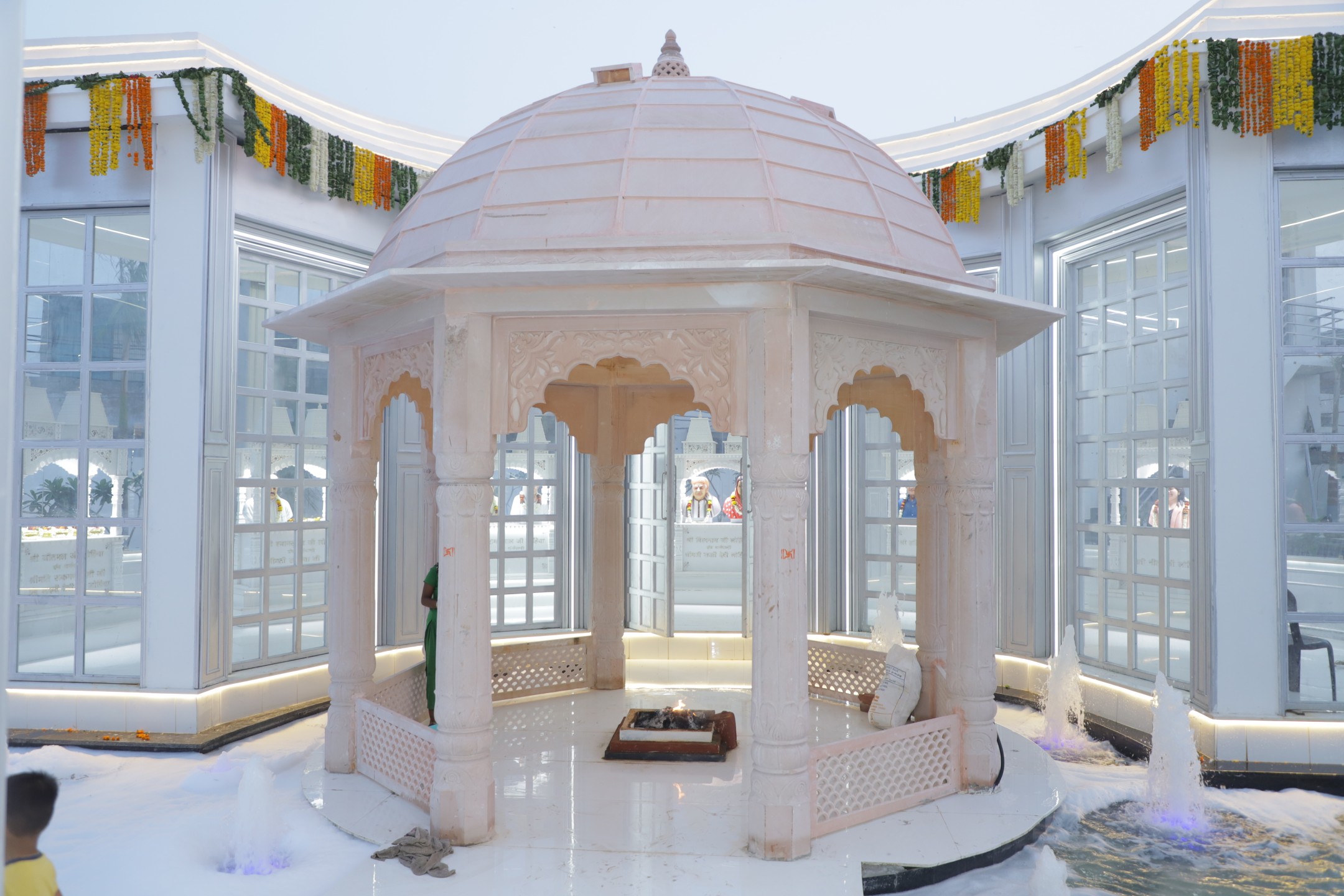 The garlanded threshold of the temple